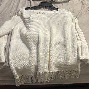 Women’s off white sweater.  Long sleeve v neck. Fringe